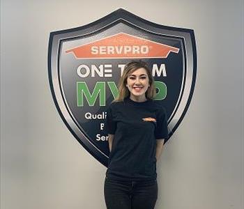 Smiling female SERVPRO employee in front of 