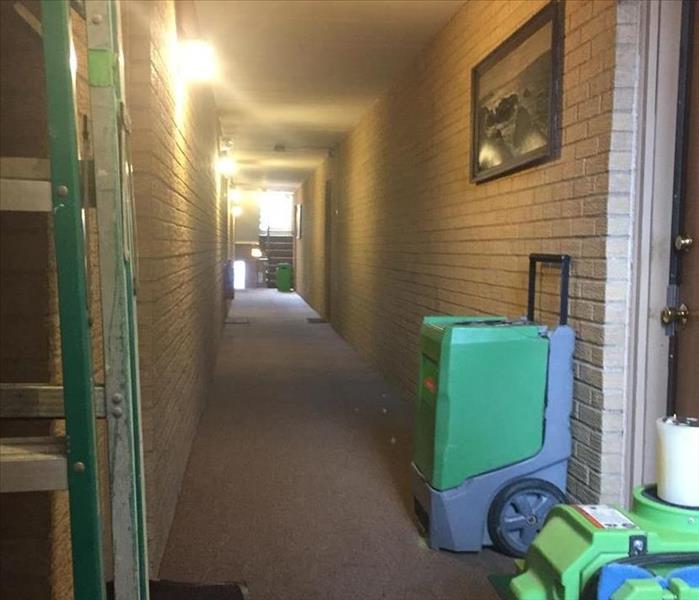 SERVPRO cleaning equipment in hallway