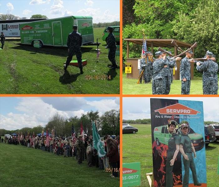 Four photos of SERVPRO representatives and people in military uniform at a park